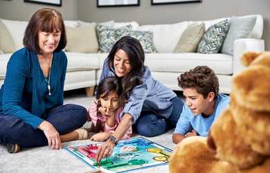 Family sitting on clean carpet — allergen-free carpet cleaning by Chem-Dry Action